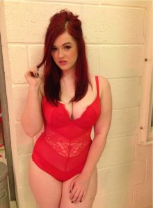 Curvy Redhead In Lingerie