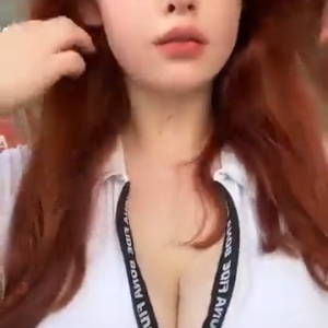 thick-redhead-busty-cleavage